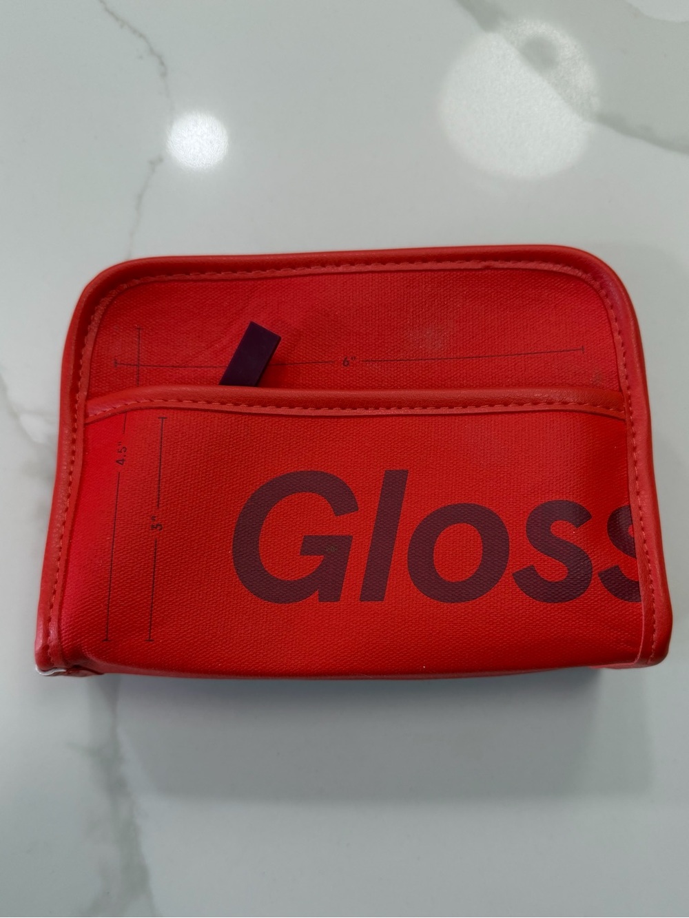 • Glossier Mini Beauty Bag •